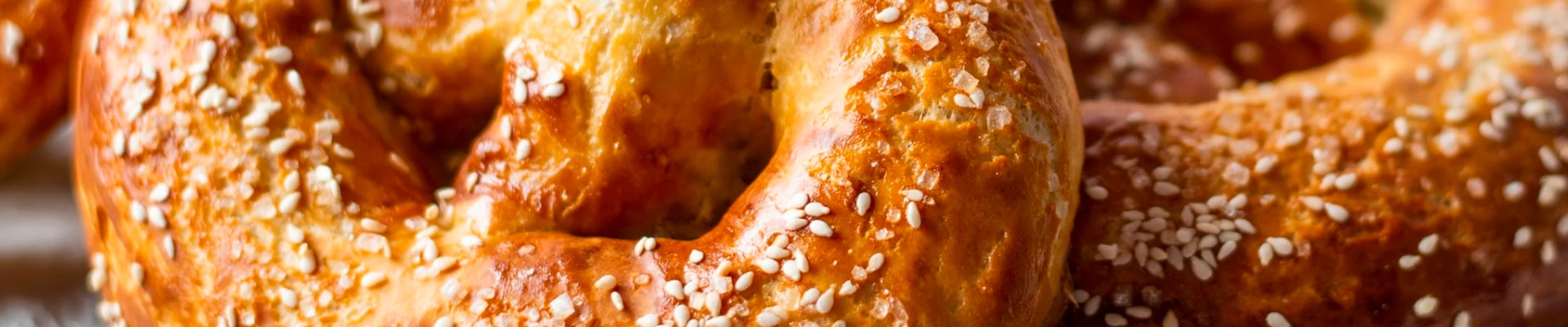 Pretzels topped with sesame seeds, baked using Allinson's flour